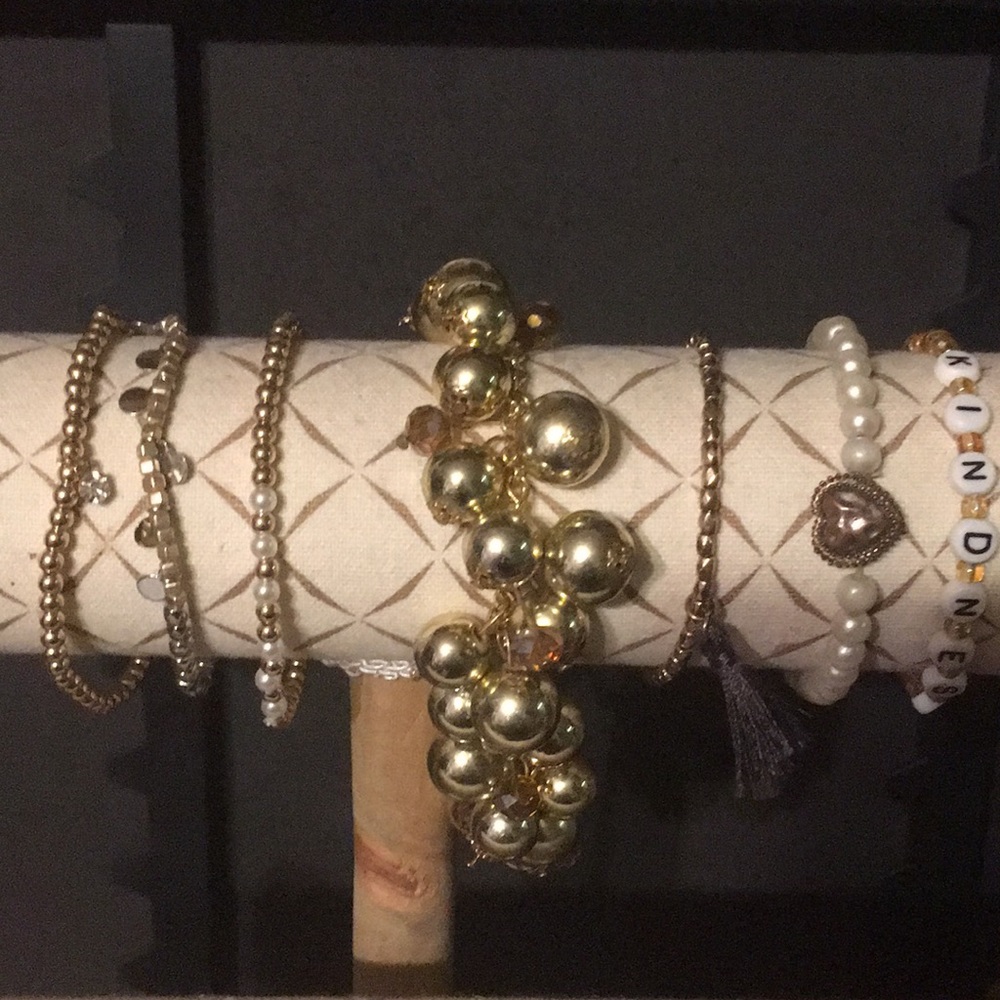 7 gold tone bracelets